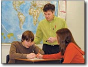 Teacher with two students